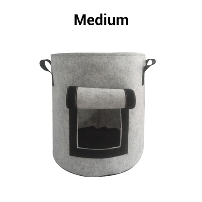 Cloth crop planting bags with harvesting windows